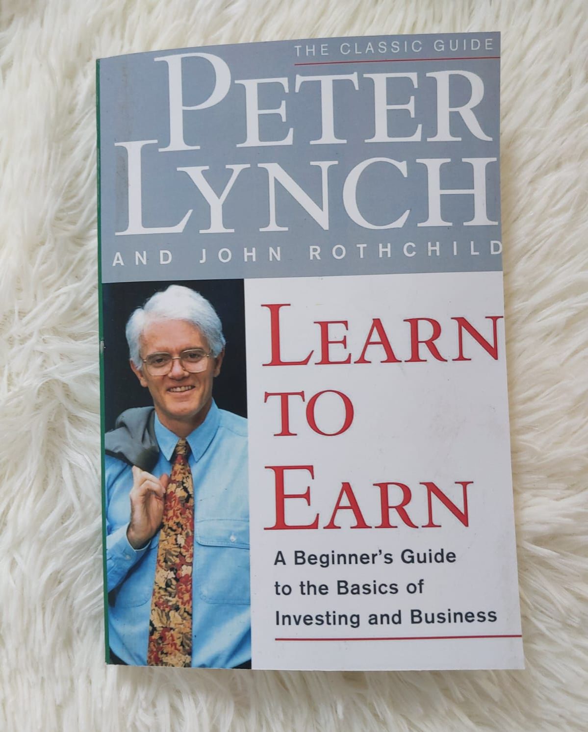 Learn to Earn: A Beginner's Guide to the Basics of Investing and Business by John Rothchild and Peter Lynch - Paperback. 