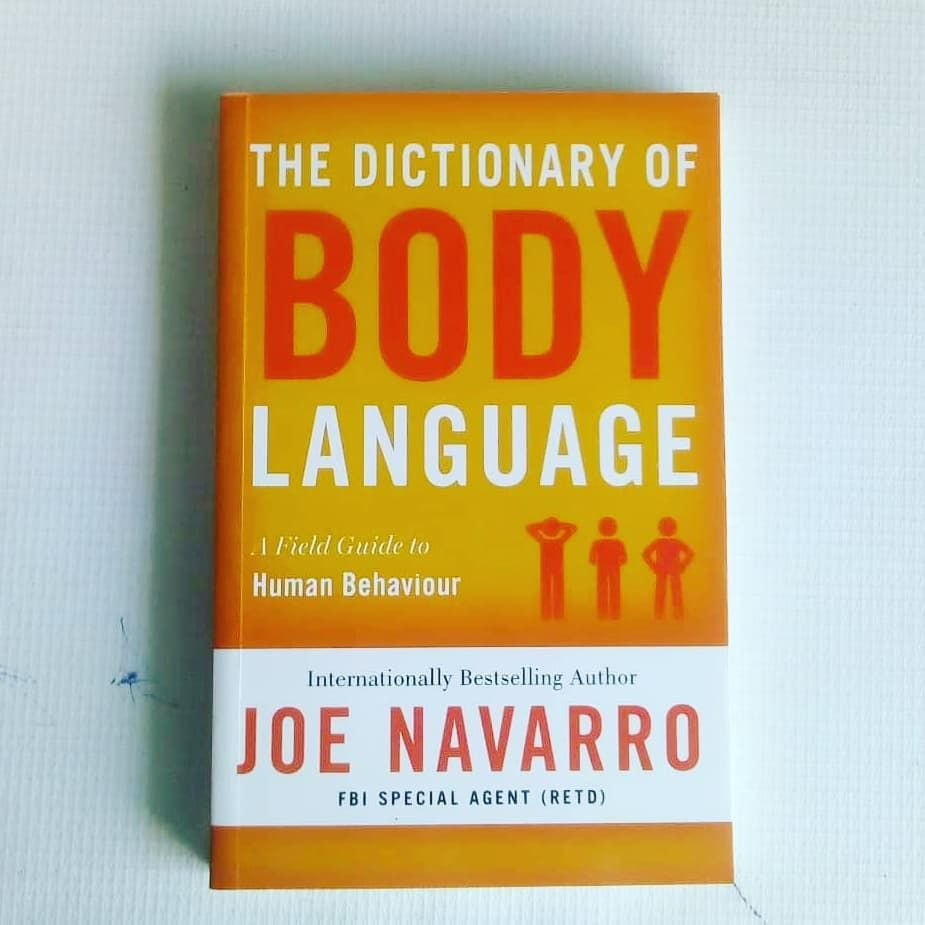 The Dictionary of Body Language: A Field Guide to Human Behavior by Joe Navarro. 