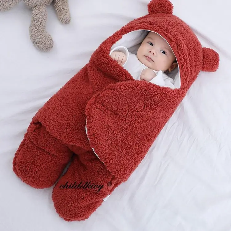 Baby sleeping with outlet blanket at 6 months