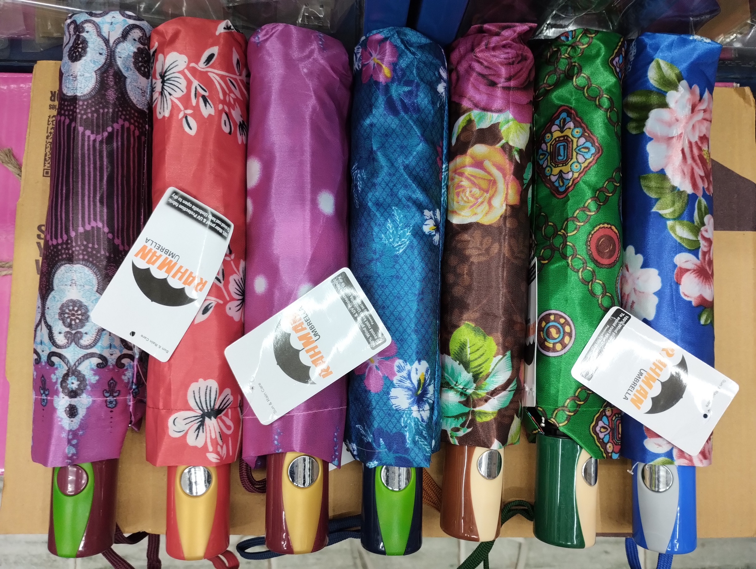 Rahman Auto Open 8 Spoke world class Heavy duty Umbrella ( Multi color Print ). 