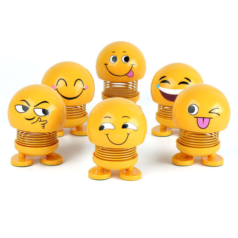 Spring doll Minions spring expression creative bobblehead car decoration. 