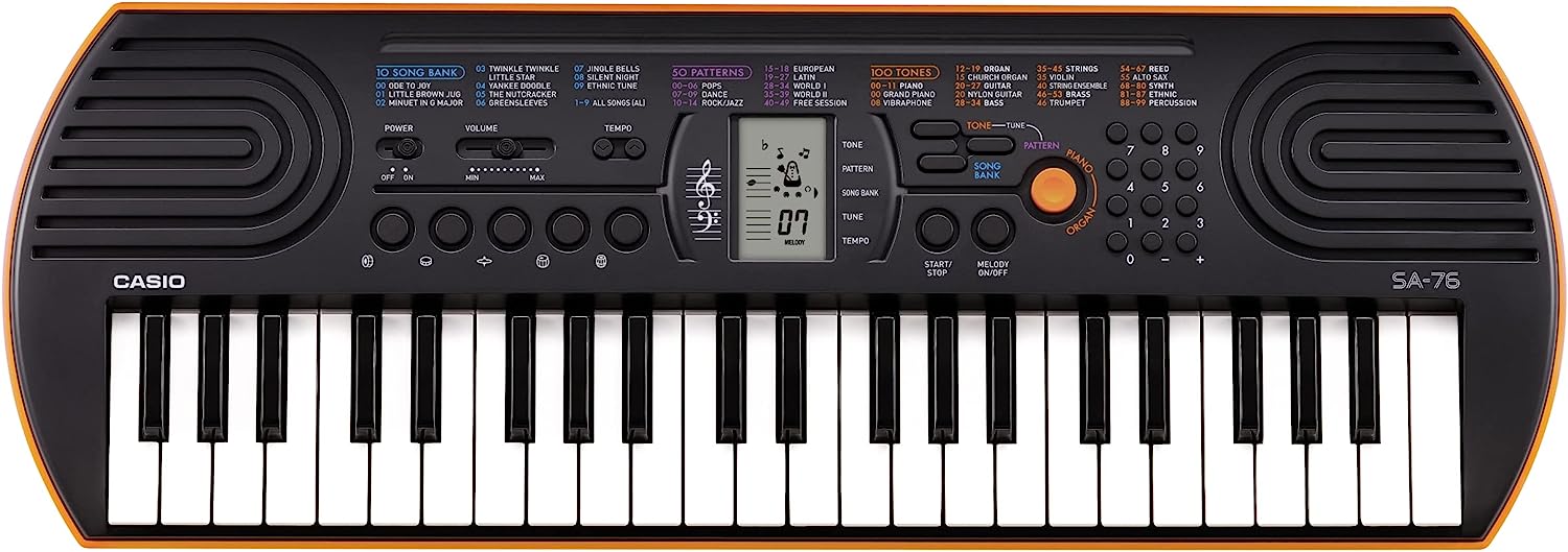Casio SA-76 Portable Musical Keyboard Piano - Black & Orange with adapter. 