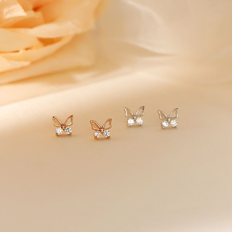 Butterfly Stud Earrings Women's New Niche Design Earrings in Autumn and Winter Simple Temperament Hollow Diamond Small Butterfly Earrings. 