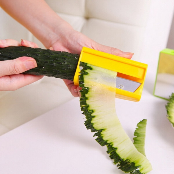 Carrot er Sharpener eeler itchen ool Vegetable Fruit Curl Sler. 