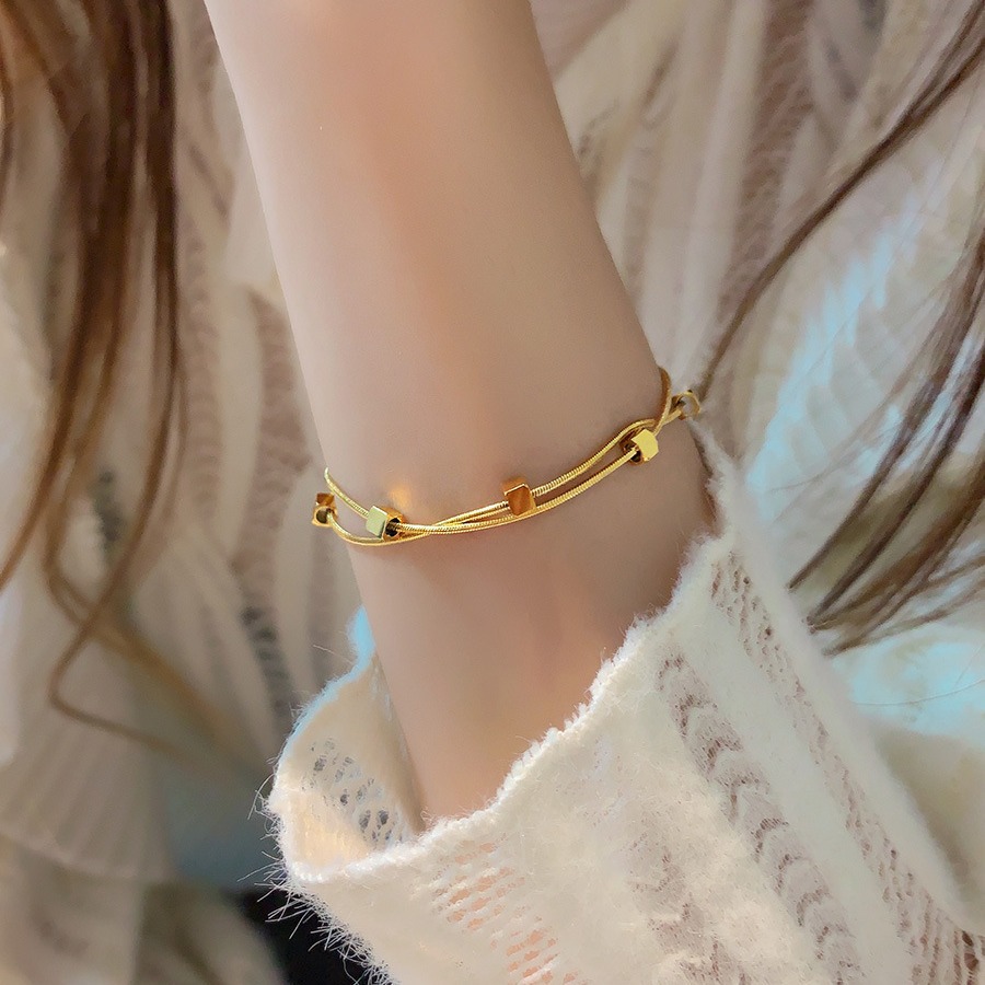 Titanium steel non-fading and non-allergenic double-layer cube snake bone bracelet for women light luxury niche design Douyin