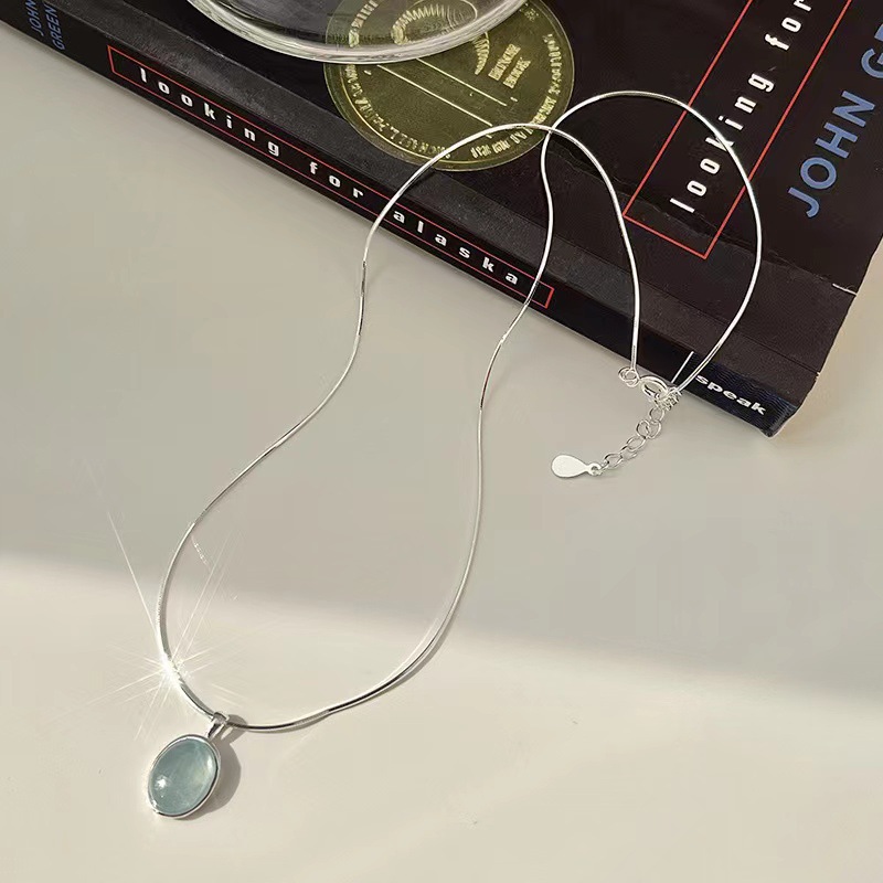 Aquamarine egg-shaped crystal necklace ins niche simple oval water drop pendant temperament versatile light luxury snake bone chain