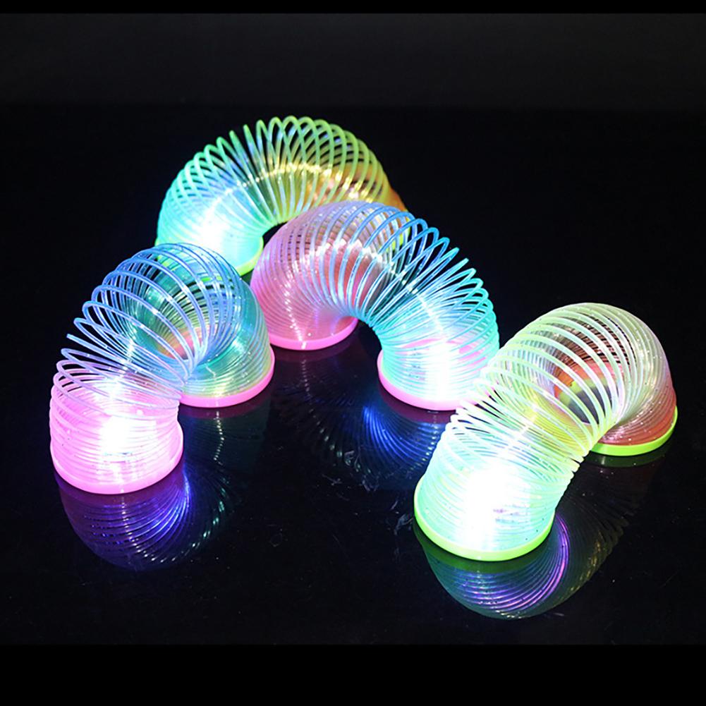 SF 1Pc Glow in Dark Walking Rainbow Spring Toy Circle Slinky Kid Magic Luminous Slinky Rainbow Spring Magic Circle Stretchy #432190. 