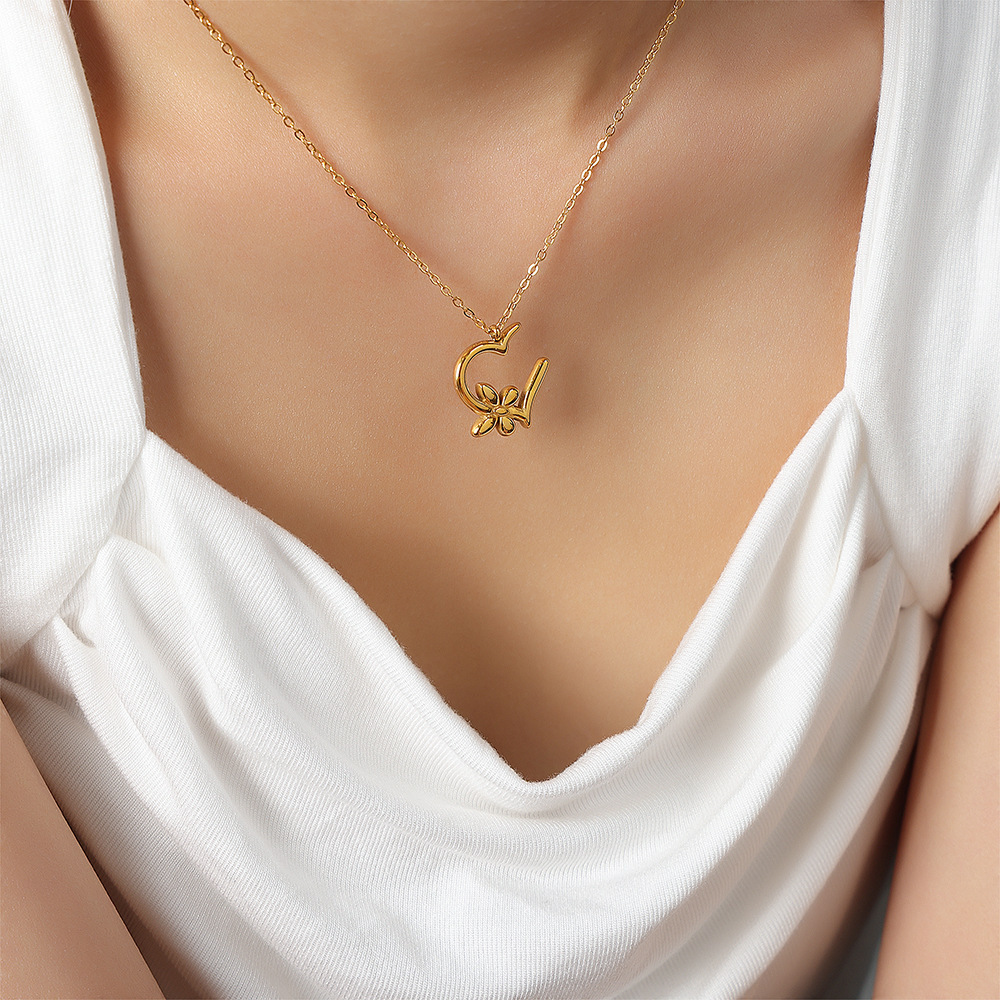 Cross border lines love butterfly flower design pendant necklace titanium steel gold plated earrings jewelry set wholesale. 