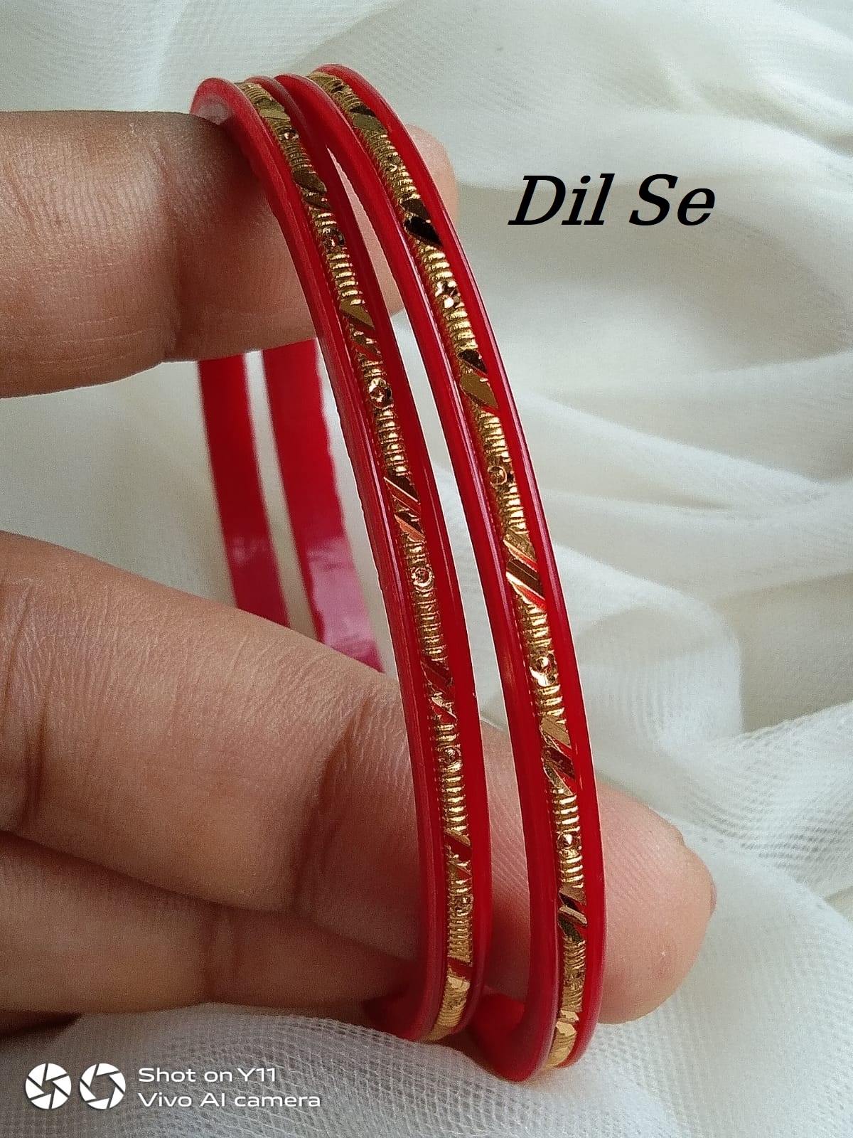 Plastic bangles with gold on sale online