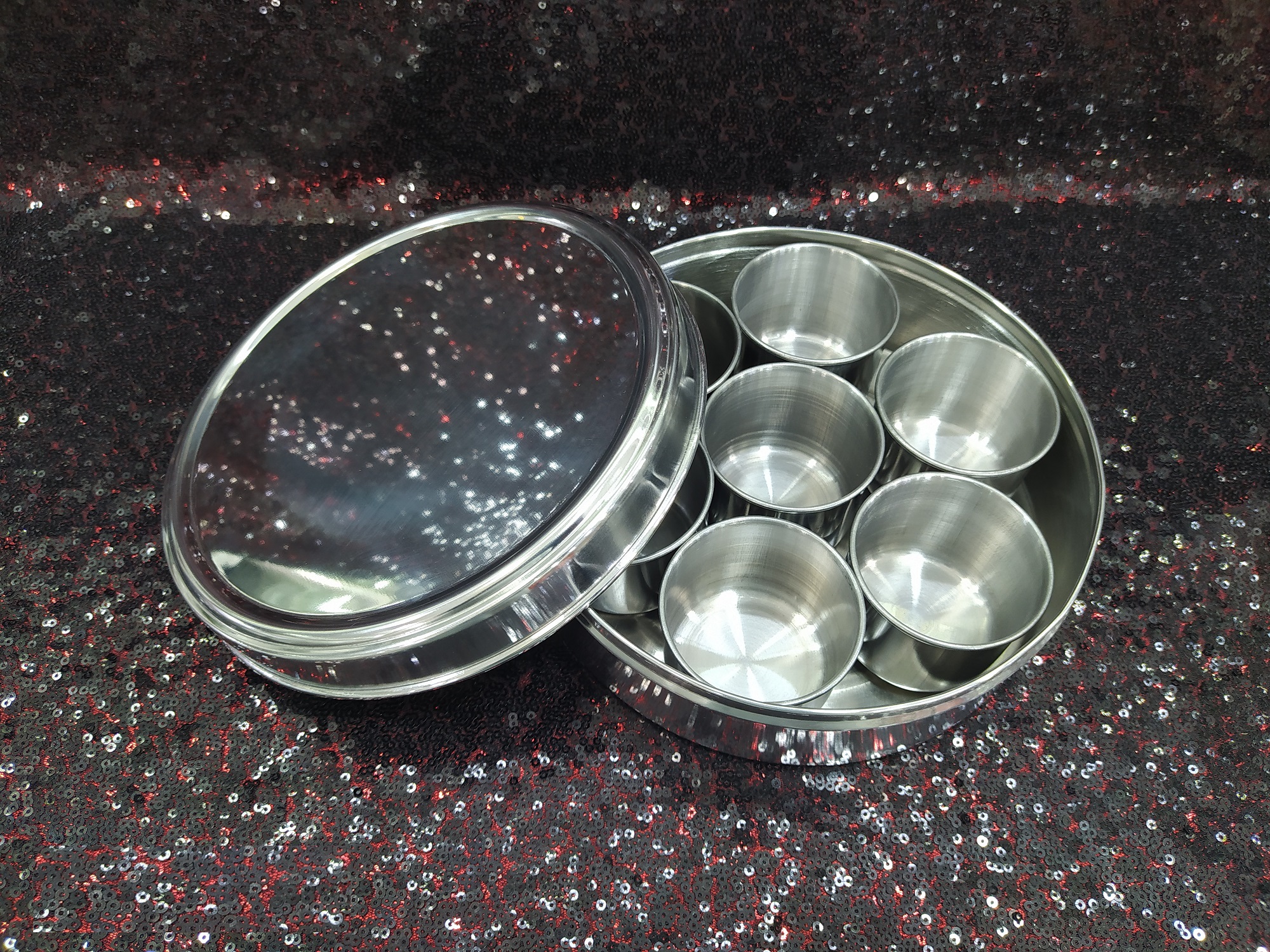 8 Piece Stainless Steel Spice Jar Set with Rotating Carousel Stand. 