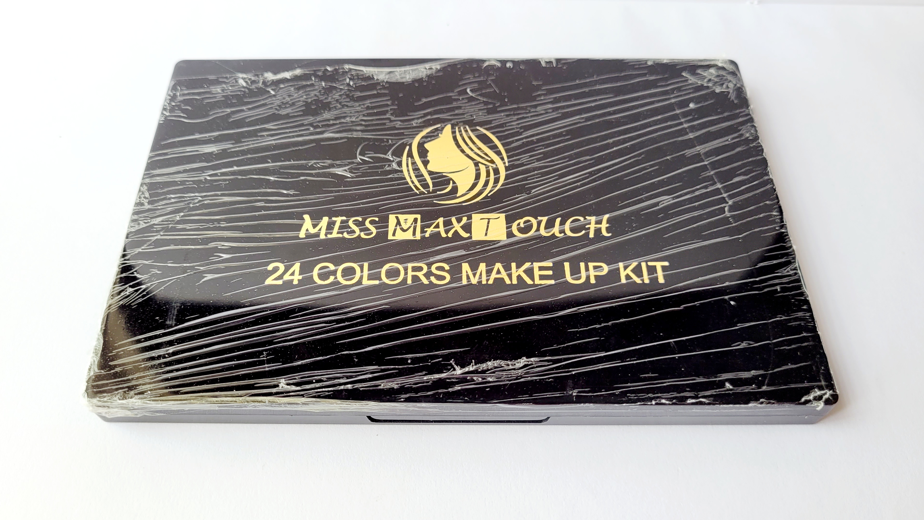 Miss Max Touch 24 colors Eyeshadow 4 in 1 Professional Makeup kit, 16 eyeshadow, 4 pigmented shade & 2 Color Blusher, 2 Compact Pressed Powder. 