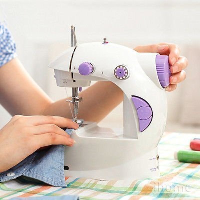 মিনি সেলাই মেশিন / Mini Sewing Machine 5 in 1 - Dual Speed Portable Mini Electric Pedal Double Threads Rewind Swing Machine. 