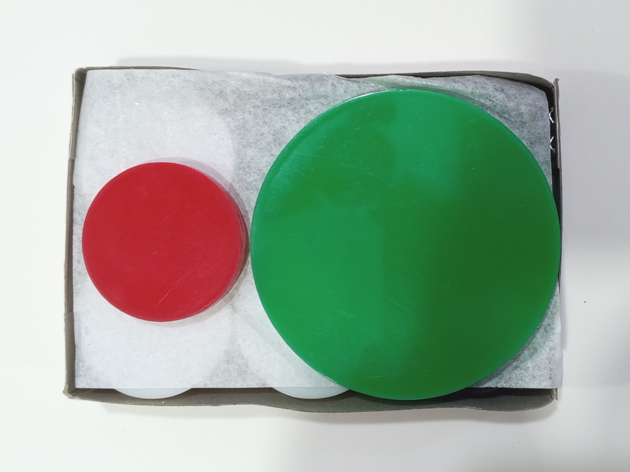Carrom Coin Set with Striker. 