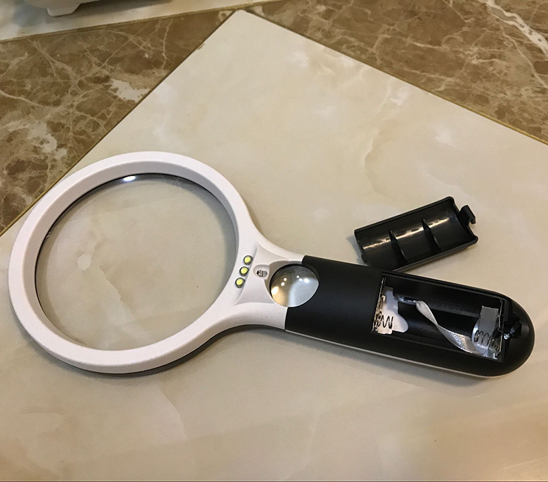 Jinghui manufacturers creative four LED light racket double light lens reading handheld 108mm magnifying glass 70108AB. 
