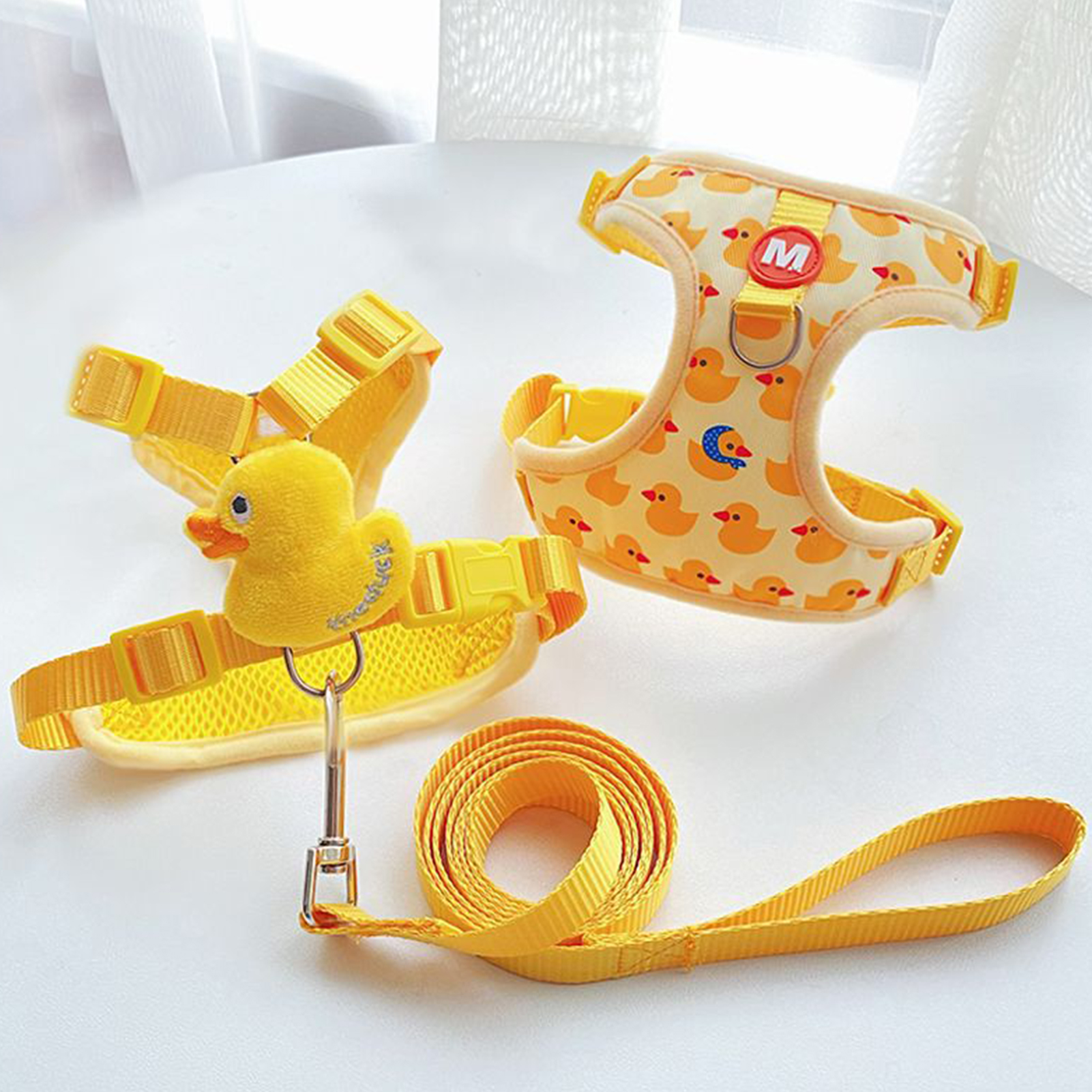 There are only 4 steps to put on the pet harness. Very easy to wear. Simply open the harness, slide your pet's front legs through the harness, then close and buckle it again, attach the harness with the double rings, and you're done!. 