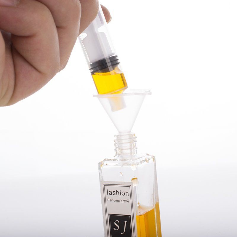 Perfume Extracts, Liquid Solution - Pump With Specialized Extraction Syringe. 