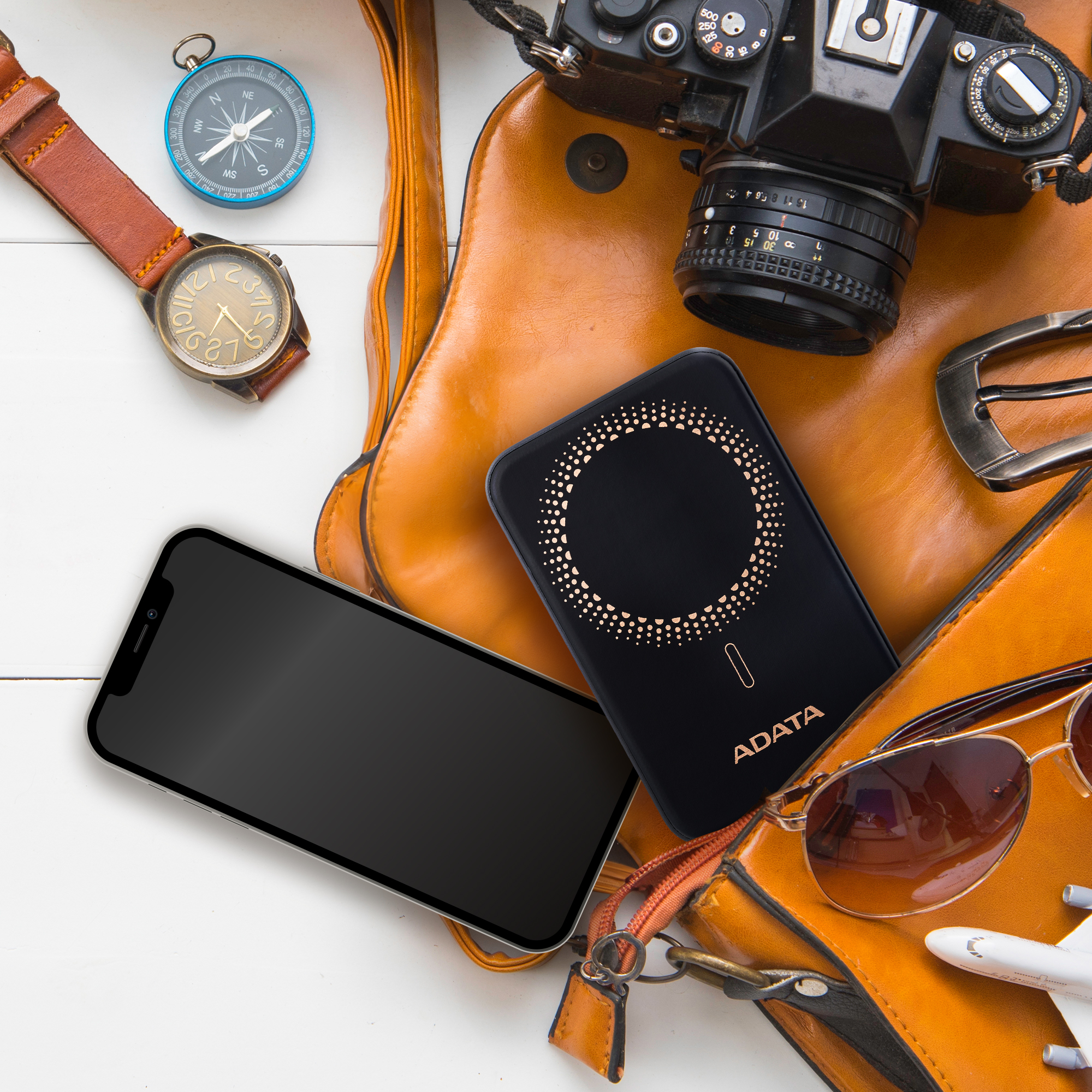 ADATA R100 10000mAh Magnetic Power Bank - Portable magnetic wireless charging - QC/PD 20W fast charging - Simultaneous 3-device charging - Multiple circuit protection mechanisms - Integrated foldable stand designed into back plate. 