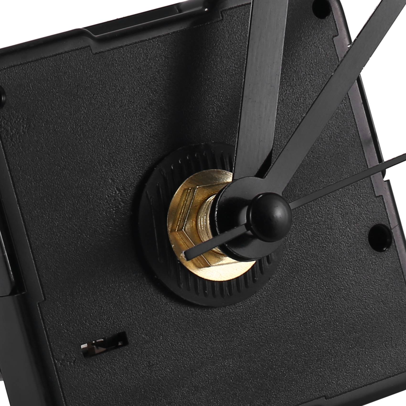 Clock Movement with Short Hands, 4/ 25 Inch Maximum Dial Thickness, 3/ 5 Inch Total Shaft Length. 