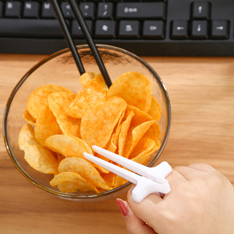 Play game finger chopsticks lazy assistant chopstick snacks hand chopsticks. 