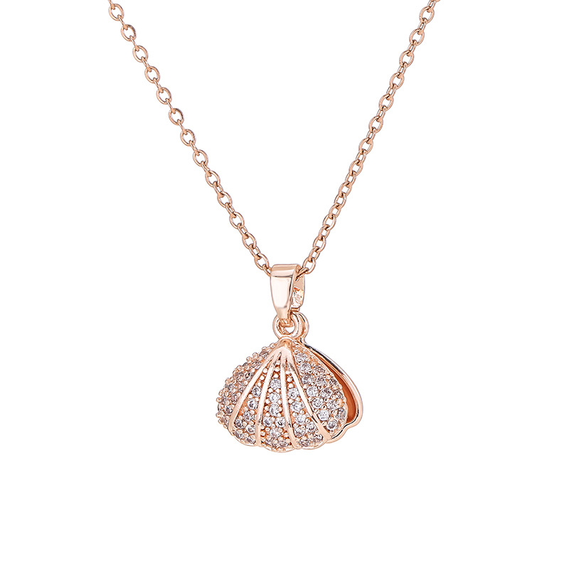 Korean version of 18k rose gold shell pearl pendant does not fade net red diamond clavicle chain niche design sense necklace. 