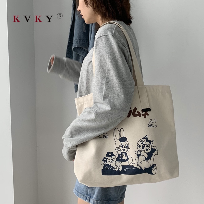 uniqlo tote bolsa kaws