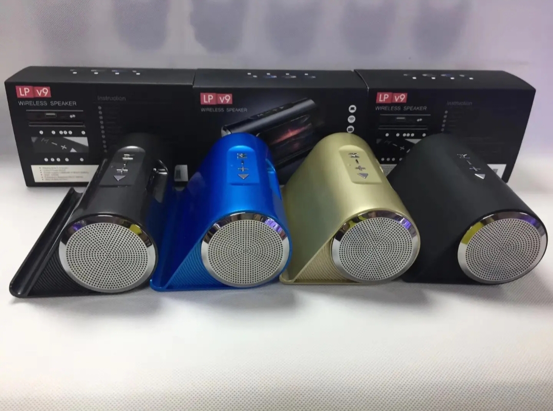 Wireless Bluetooth Speaker LP V9 Portable Speaker FM Radio USB,TF Card Reader Mobile Phone Bracket Design. 