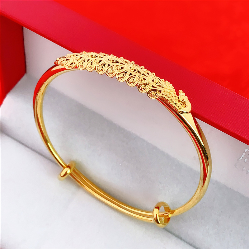Send the national wind and sand gold glossy dragon and phoenix bracelets to the mother, the filigree peacock push and pull bracelet, the bride's wedding jewelry