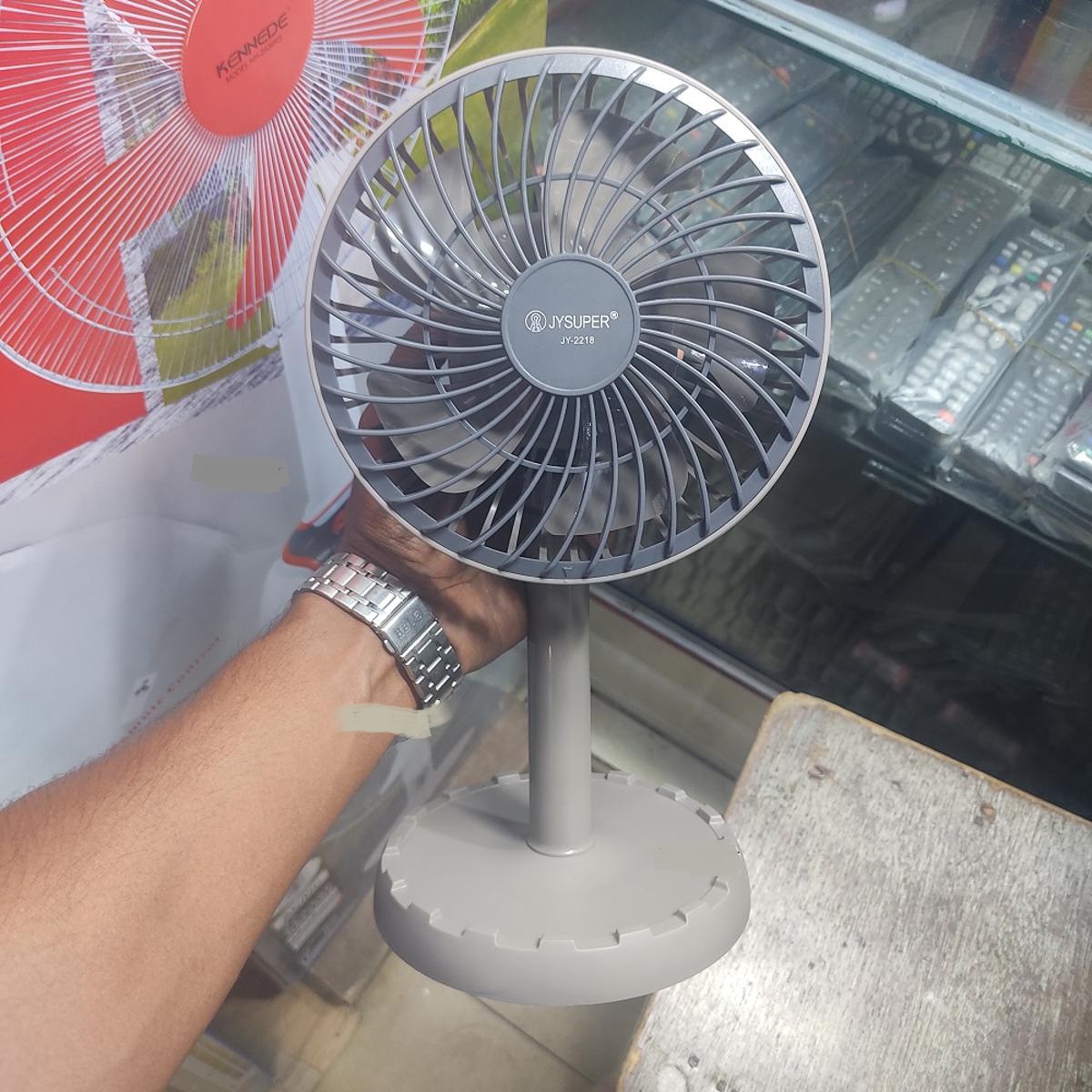 JYSUPER JY-2218 Portable Mini Desk Fan Professional Rechargeable Strong Wind Left to Right Oscillating Angle 45 Degrees AC DC. 