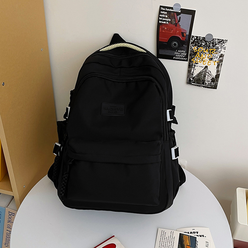 College student school bag cream solid color Japanese college style ins girl backpack high school student simple and versatile backpack. 
