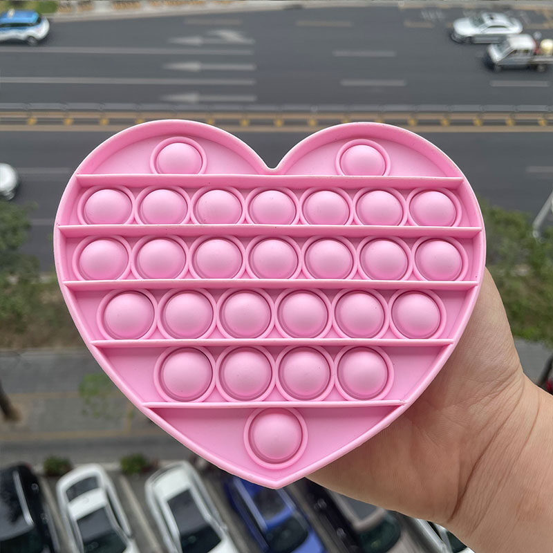 heart pink pop toy