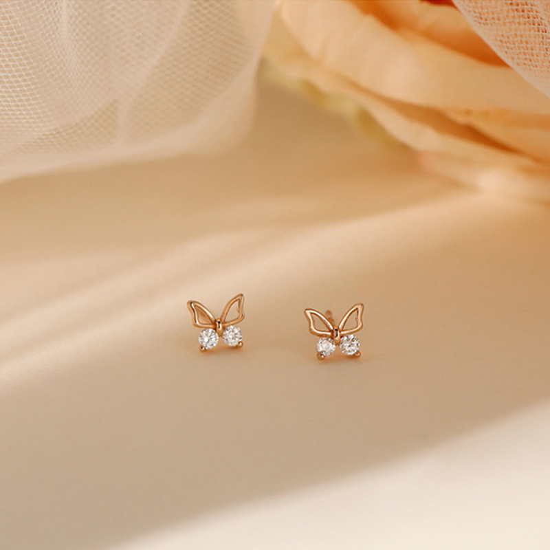 Butterfly Stud Earrings Women's New Niche Design Earrings in Autumn and Winter Simple Temperament Hollow Diamond Small Butterfly Earrings. 