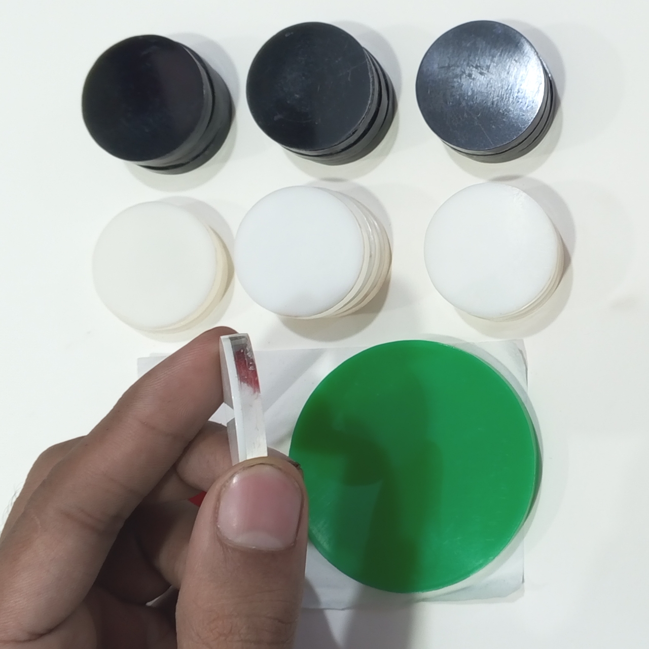 Carrom Coin Set with Striker. 