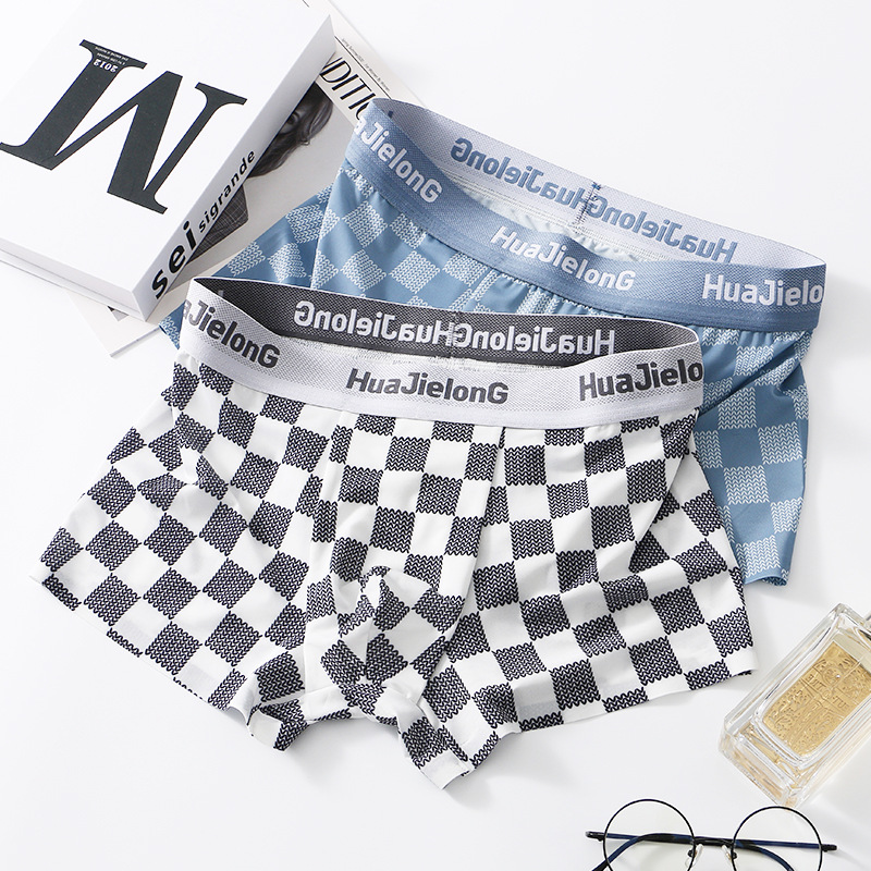 Hua Jielong's new men's underwear printing wholesale simple mid-rise slim breathable ice silk thin boxer pants on behalf of the hair. 