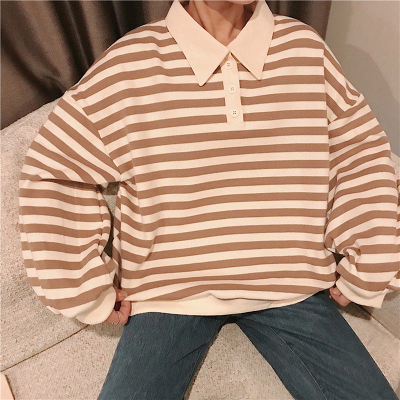 collared shirt under sweatshirt girl aesthetic