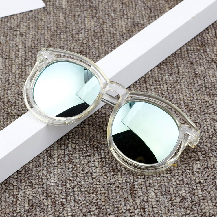 Factory direct sales children's sunglasses round frame hollow color film sunglasses anti-ultraviolet transparent frame sunshade Korean version