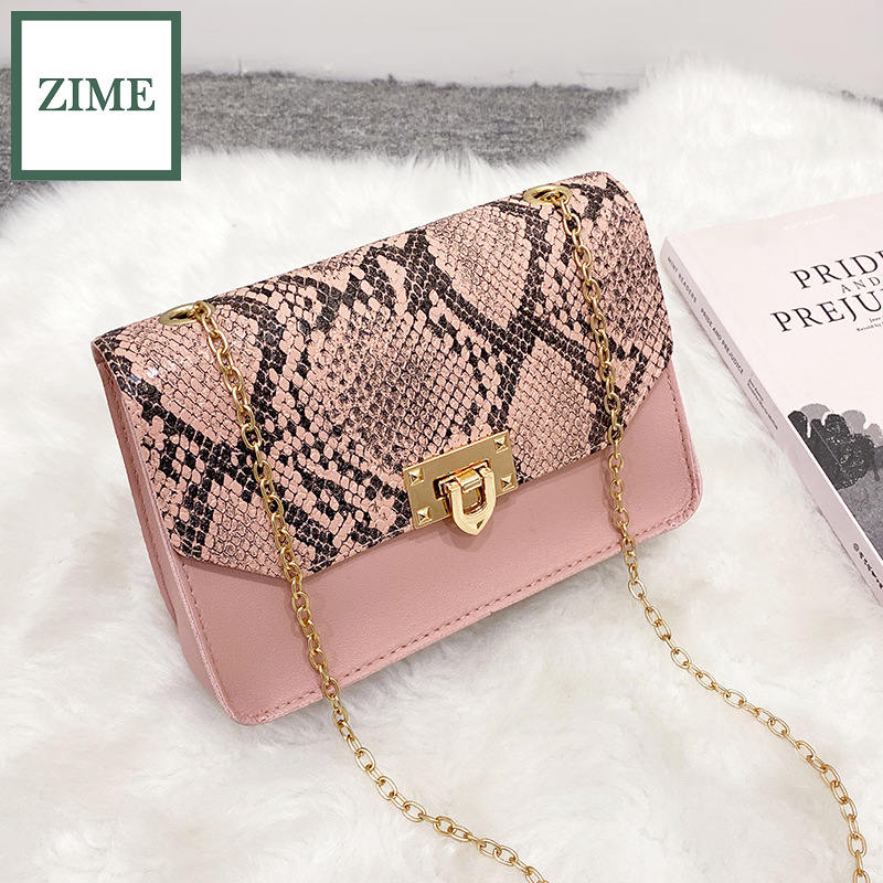 Pink snake discount print clutch bag