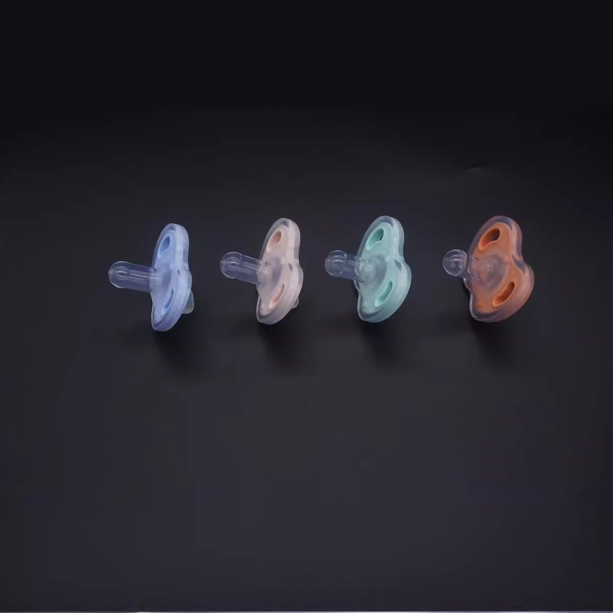 Baby two-color ultra-soft silicone pacifier with round head flat head strap chain and storage box. 