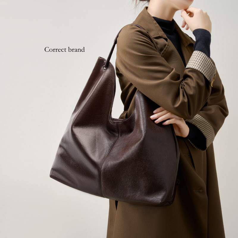 New Model Vegetable Tanned Cowhide Popular Designer Large Capacity Textured Tote Versatile Shoulder Bag Designer For Class And_voghion.com