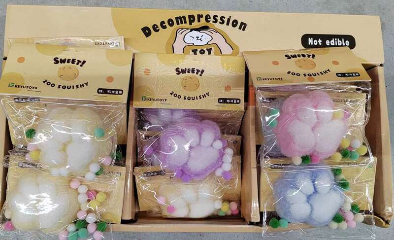 The same ultra soft pinching and plush cat paw simulation mud animal footprint decompression toy. 
