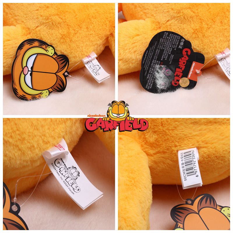 Genuine Garfield movie with doll plush toy orange Garfield fat cat. 