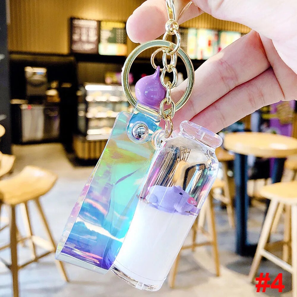 【3C VictoryEagle】Creative Cute Milk Bottle Keychain Moving Liquid Quicksand Drift Bottle Keyring For Pendant Toy. 