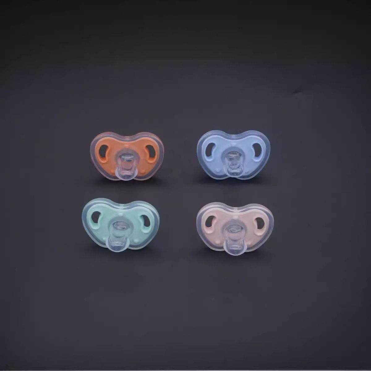 Baby two-color ultra-soft silicone pacifier with round head flat head strap chain and storage box. 
