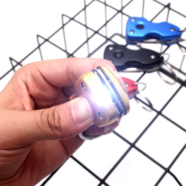 Multi-functional Keychain Knife Outdoor 6-in-1 Folding Mini Screwdriver Stainless Steel Tool Knife with LED Keychain. 