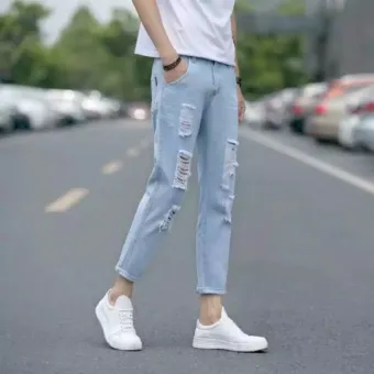 ripped sky blue jeans