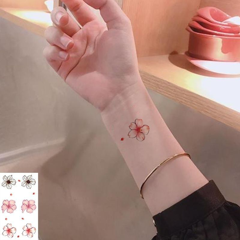Sakura tattoo sticker waterproof long-lasting flower hand plain flower net red ins wind small fresh small pattern clavicle sticker. 