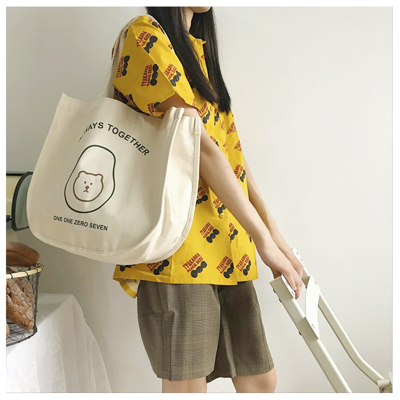 Pick up flowers, cloth language, avocado bear, large capacity school bag, shoulder strap, adjustable hand-carried one-shoulder canvas bag