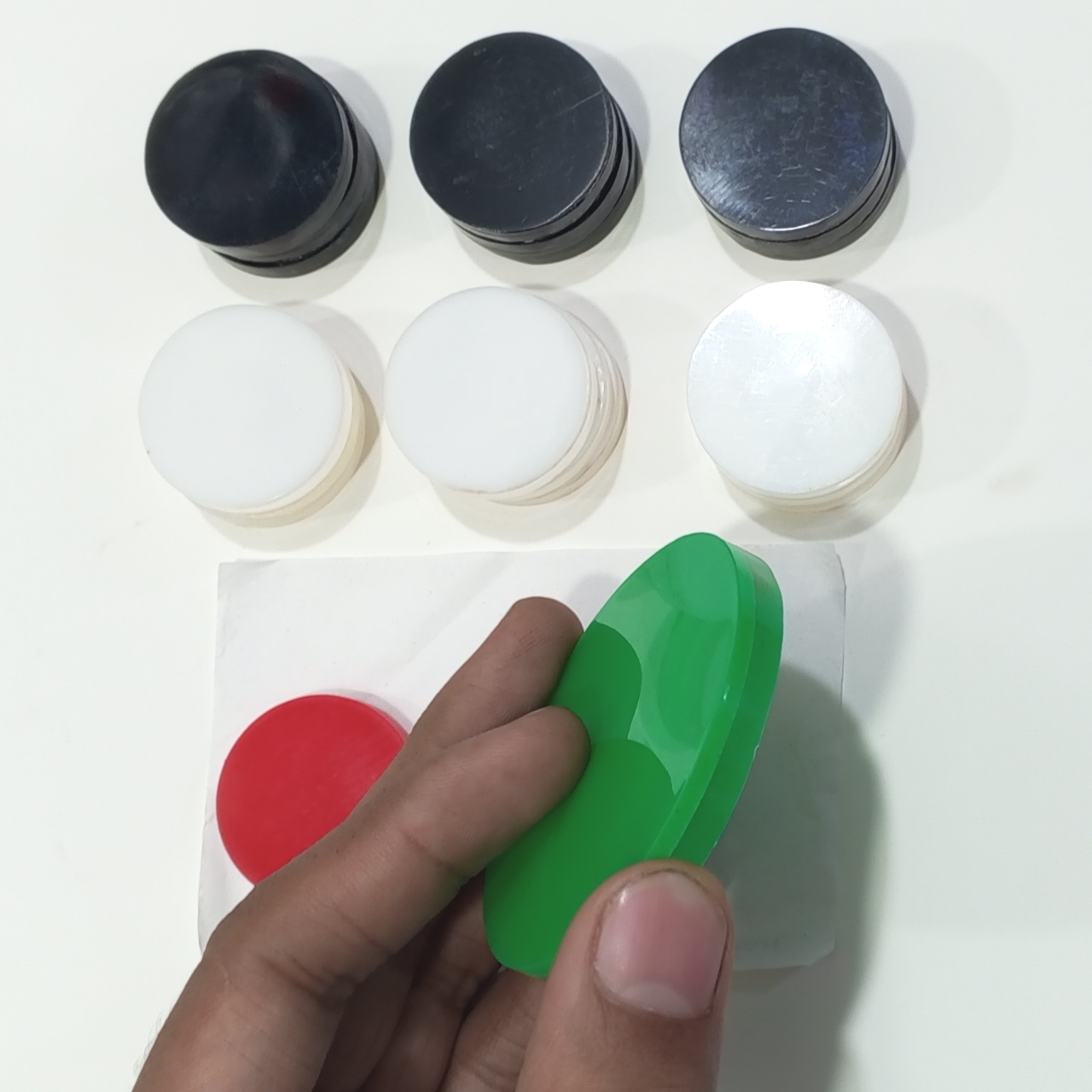 Carrom Coin Set with Striker. 