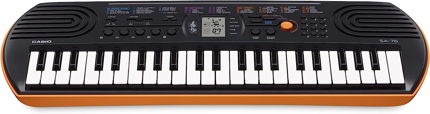 Casio SA-76 Portable Musical Keyboard Piano - Black & Orange with adapter. 