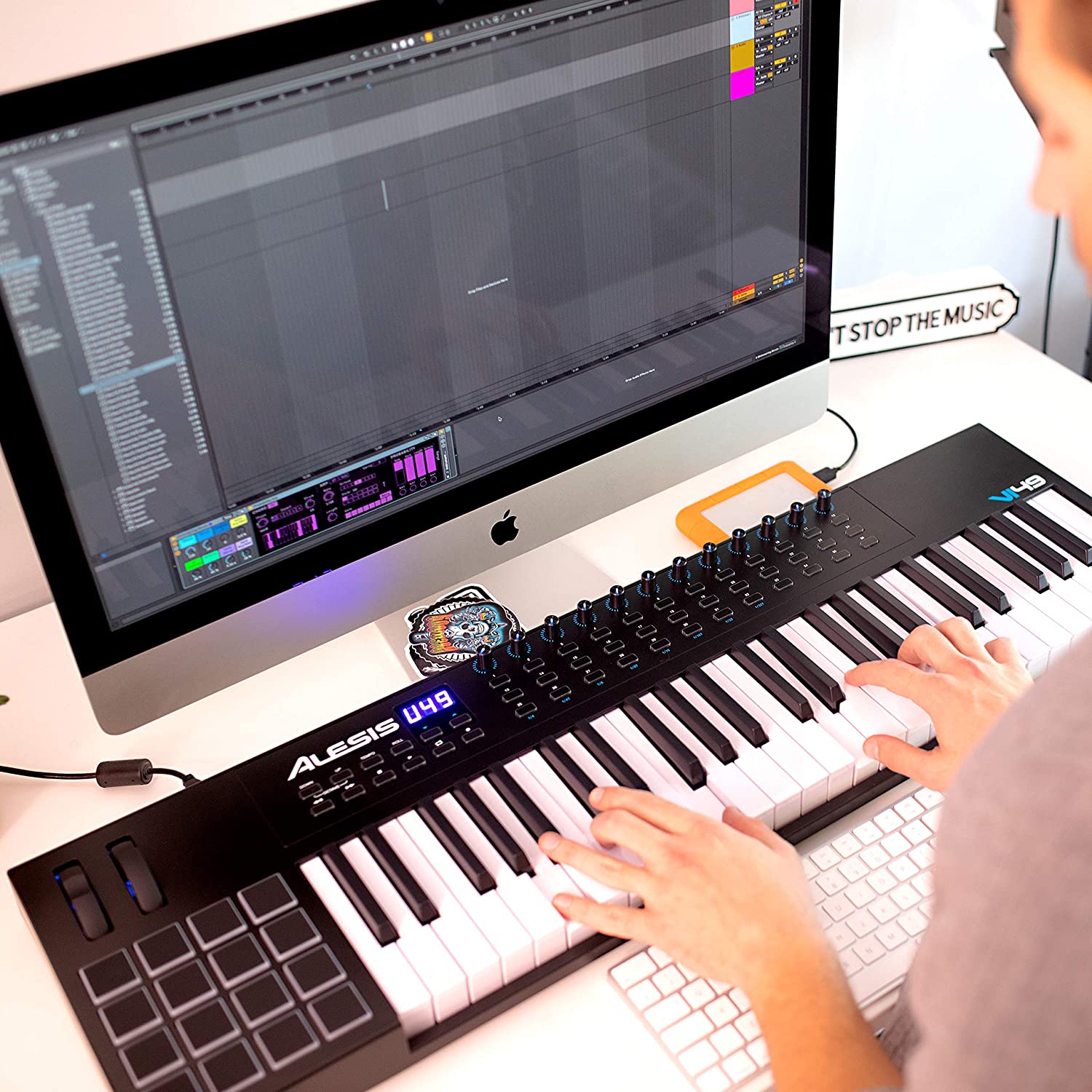 Alesis VI49 - 49 Key USB MIDI Keyboard Controller with, 16 Drum Pads, 12 Assignable Knobs, 36 Buttons and 5-Pin MIDI Out. 