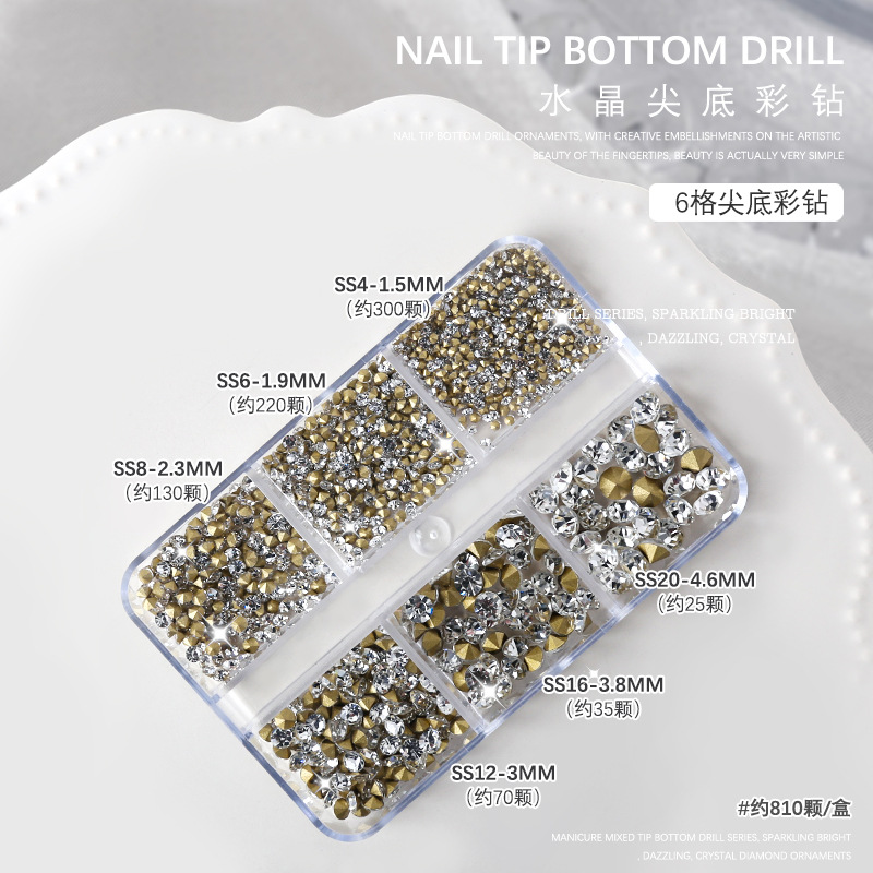 Nail jewelry, white diamonds on gold background, AB colored diamonds, culets, 6 compartments, boxed mixed size, size nails, pointed diamonds. 